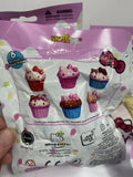 (4) - HELLO KITTY Cupcake Squishme Toy Collect Them All